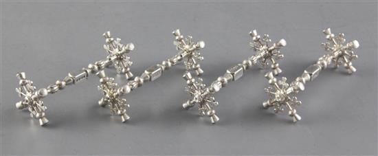 A set of four Victorian silver knife rests by William Knight, 9cm.